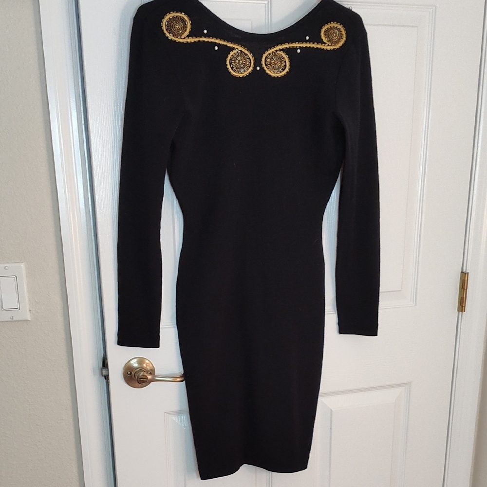Chic Black Dress with Gold Detailing